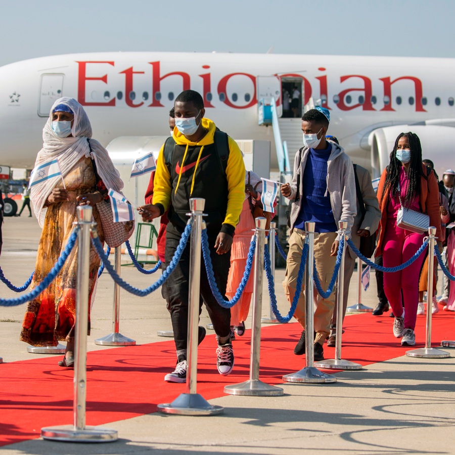 Ethiopian olim exiting the plane after touching down at Ben Gurion Airport (Credit: Olivier Fitoussi, courtesy of The Jewish Agency for Israel)