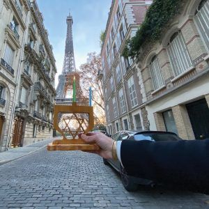 A Jewish Agency Israeli emissary serving in Paris lights Hanukkah candles