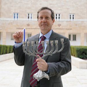 Jewish Agency Chairman Isaac Herzog lights Hanukkah candles in Jerusalem