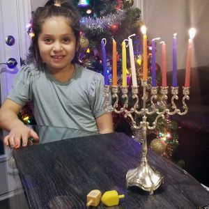 Lighting Hanukkah candles in Canada