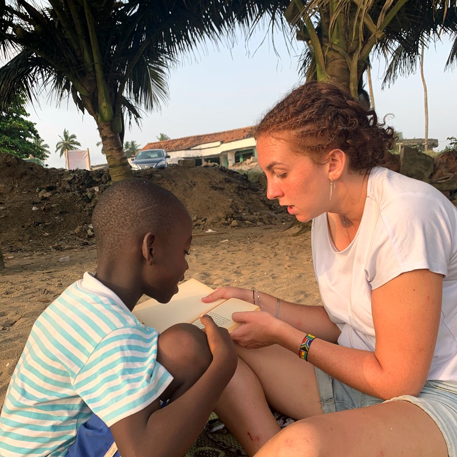 Adina with a local student in Ghana