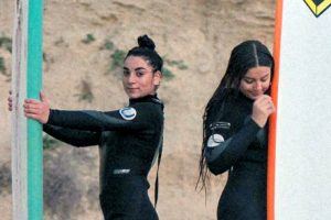 Noga, right, with another Hadassah Neurim student about to surf
