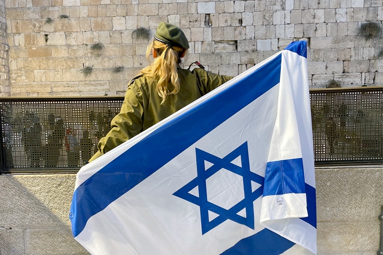 Maya, an Aardvark Israel participant, in front of the Kotel in Israel