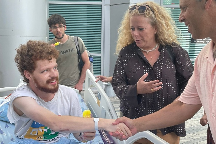 Mark Wilf and Ayelet Nahmias Verbin, meet with Snir Vitnberg, who was wounded in the attack
