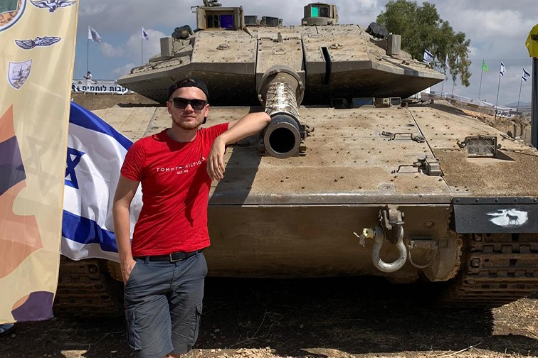 Gregory with a tank in Israel