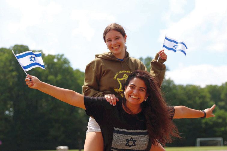 Maayan with another camp staff member
