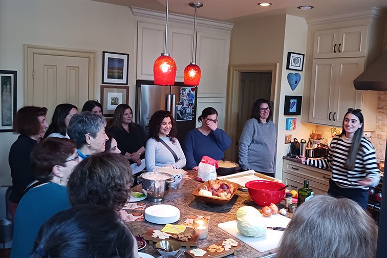 Stav leading a cooking class