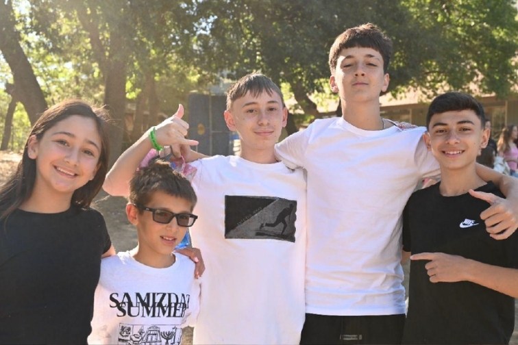 The cousins together at camp